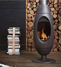 Печь-камин Invicta OVE стальная в интерьере Амазонка бай фото в Витебске