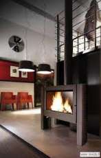 Печь-камин Invicta Antaya в интерьере чугунная Амазонка бай фото в Витебске