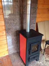 Купить стальной камин Везувий ПК-01 (270) в Витебске фото в интерьере в Витебске