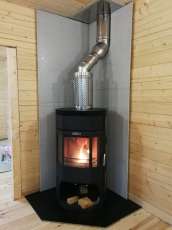 Недорогой камин с отделкой шамотом Сибирь 12 фото в интерьере в Витебске