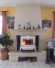 Печь-камин чугунный Invicta Bradford в интерьере Амазонка бай фото в Витебске