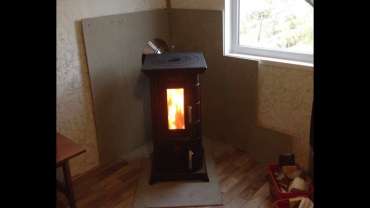 Отопительная печь Термофор Статика Тетра, чёрная бронза фото в интерьере в Витебске