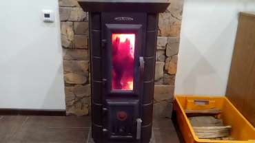 Стальная печь Термофор Статика Тетра, чёрная бронза фото в интерьере в Витебске