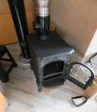 Недорогой печь-камин со стеклом Сибирь 6 фото в интерьере в Витебске