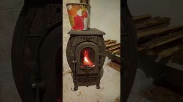 Печь отопительно-варочная чугунная "Сибирь" фото в интерьере в Витебске