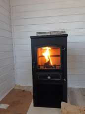 Недорогой камин со стеклом ЭТНА (БКД) с плитой и ТО фото  в Витебске