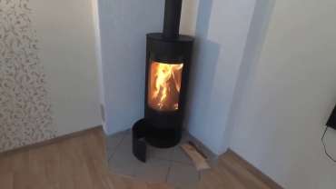 Стильная печь-камин с шамотом Мета-Бел Селигер в Витебске фото в интерьере в Витебске