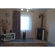 Стальной камин с шамотом Мета-Бел Ритм L фото в интерьере в Витебске