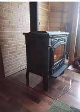 Печь-камин чугунный FireWay Gunter в интерьере чёрный Амазонка бай фото в Витебске