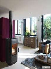 Печь-камин чугунный Invicta Gomont в интерьере Амазонка бай фото в Витебске