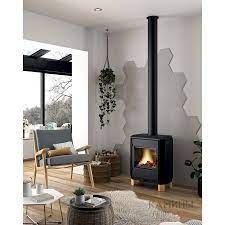 Печь-камин чугунный Invicta Carolo в интерьере Амазонка бай фото  в Витебске