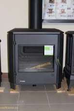 Печь-камин чугунный Invicta Carolo в интерьере Амазонка бай фото  в Витебске