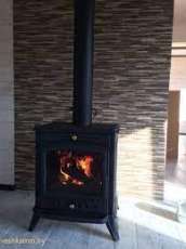 Печь-камин чугунный Invicta Altea в интерьере Амазонка бай фото в Витебске