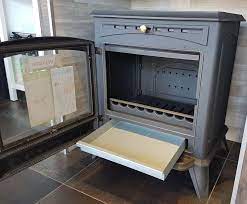 Печь-камин чугунный Invicta Altea в интерьере Амазонка бай фото в Витебске