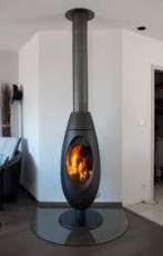 Печь-камин чугунный Invicta Ove в интерьере Амазонка бай фото в Витебске