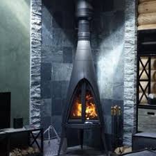 Печь-камин чугунный Invicta Pow-Wow в интерьере Амазонка бай фото в Витебске