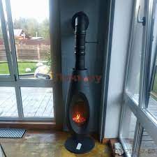 Печь-камин чугунный Invicta OVATIO в интерьере Амазонка бай фото в Витебске